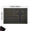A dark olive green embroidered patch featuring a cross and flag designs.