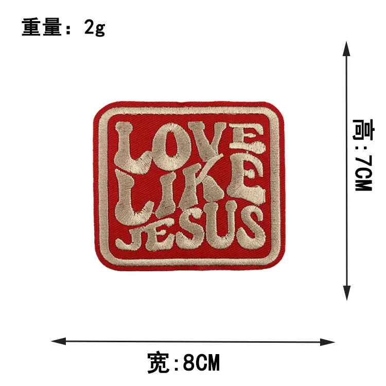 Red embroidered patch with the text LOVE LIKE JESUS on it