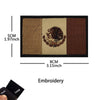 Tactical patch featuring an embroidery of an eagle on a flag design with brown and tan colors.