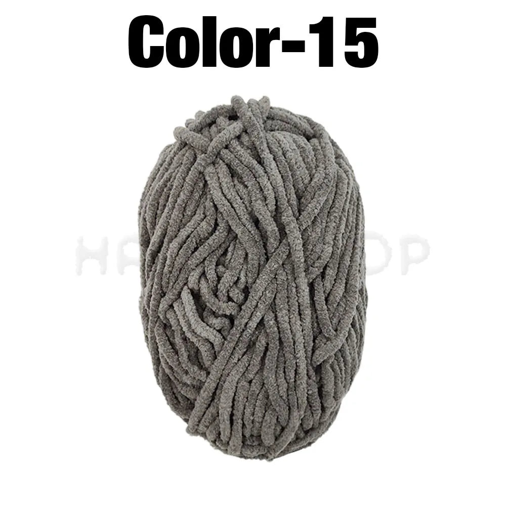 A ball of gray chenille yarn labeled Color-15 for crafting.