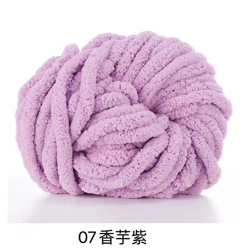 A ball of fluffy lavender chenille yarn.