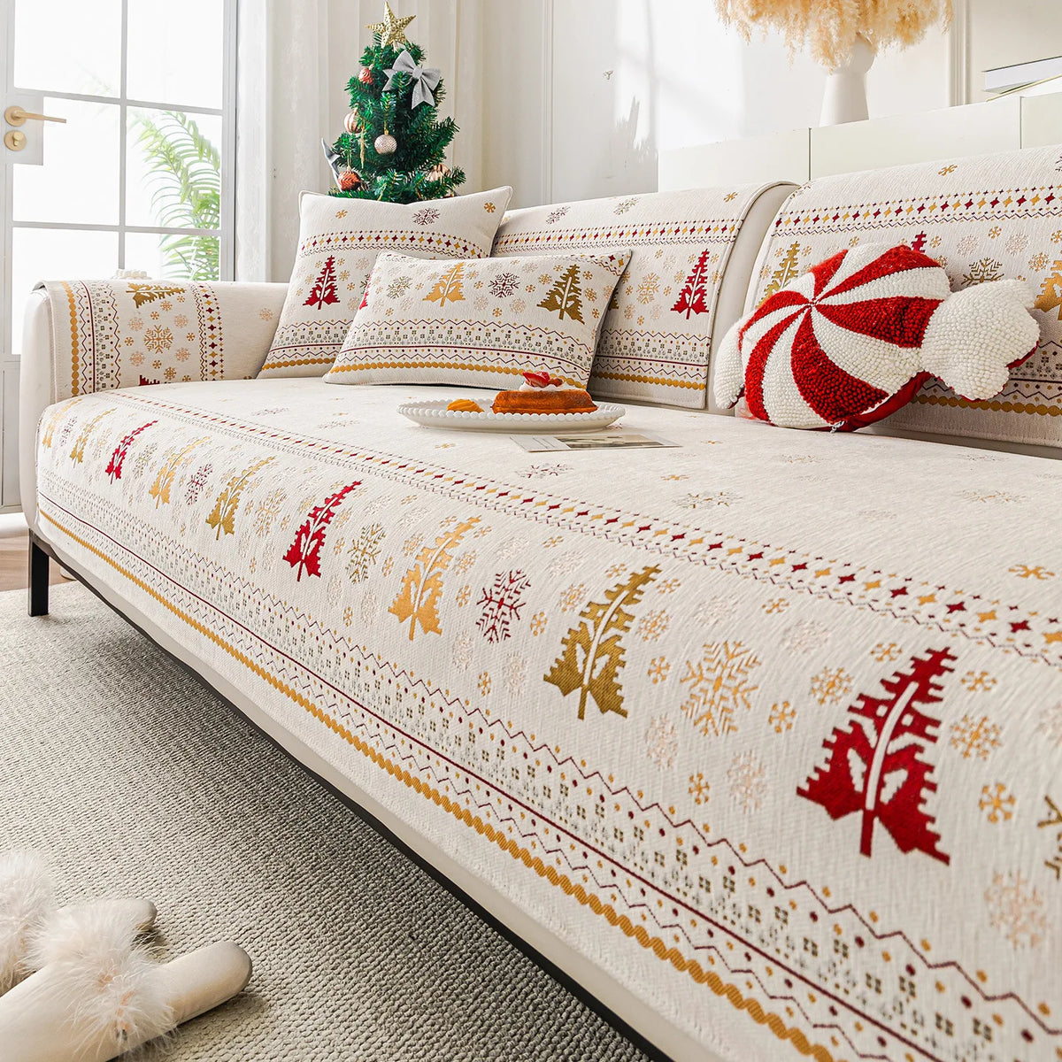 Decorative sofa seat covers featuring a white background with gold and red Nordic patterns on a light-colored sofa.