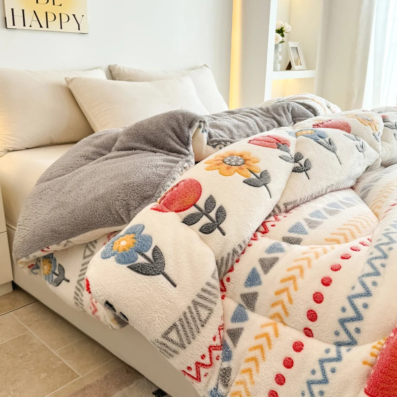 A cozy, thick lamb'swool winter blanket in various neutral and floral patterns is displayed on a bed.