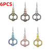 Six pairs of durable stainless steel crafting scissors in various finishes including gold, rose gold, and silver tones