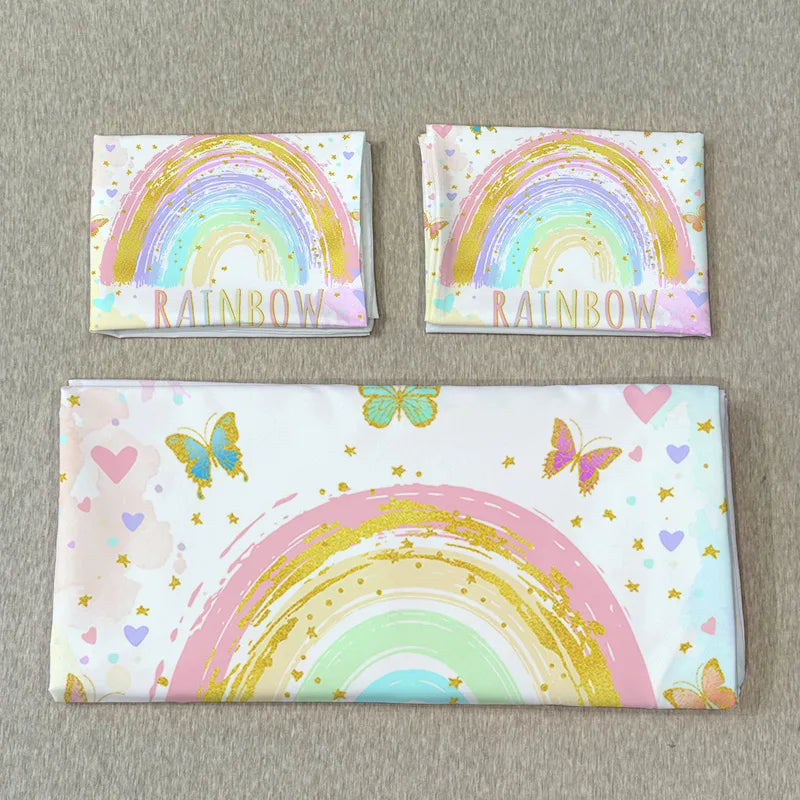 A set of three butterfly rainbow quilt covers featuring pastel colors and a rainbow design.