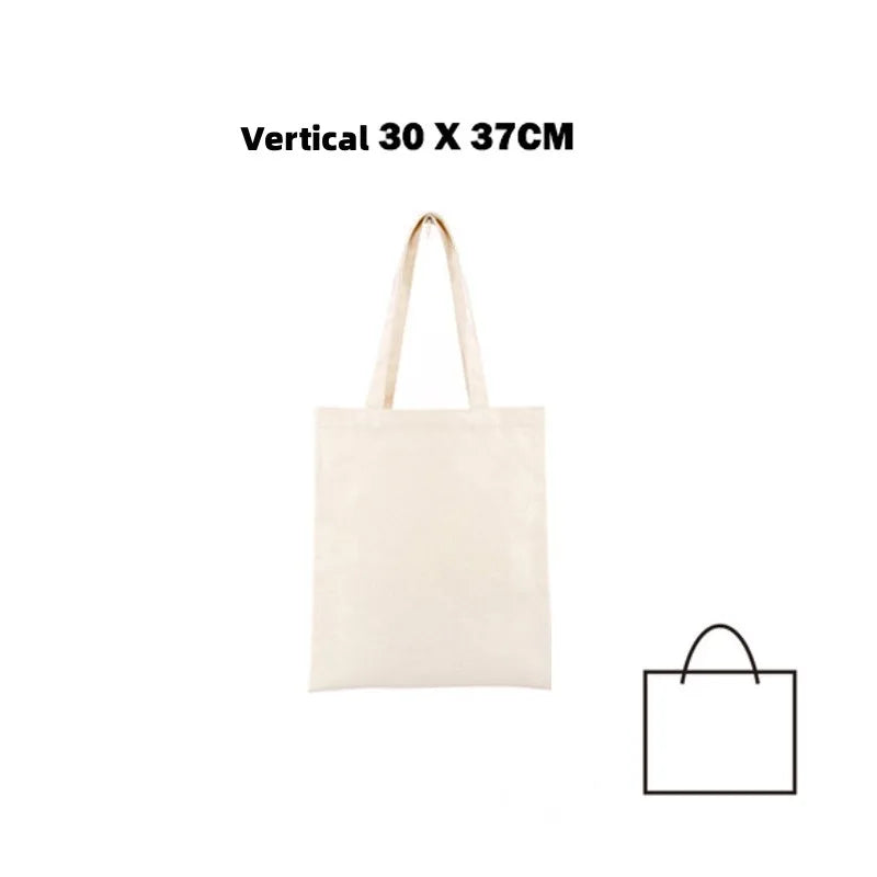 A plain off-white canvas tote bag with light brown handles.