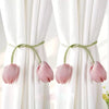 Pink tulip flower curtain tie backs with green fabric ties on white sheer curtains