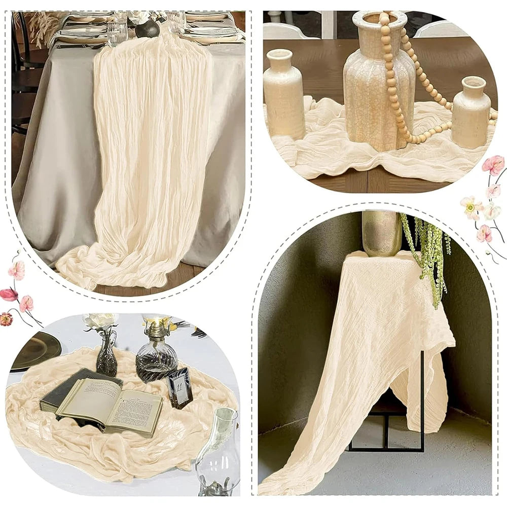 A beige boho gauze table runner draped elegantly on a wooden table with decorative glass bottles and floral accents.
