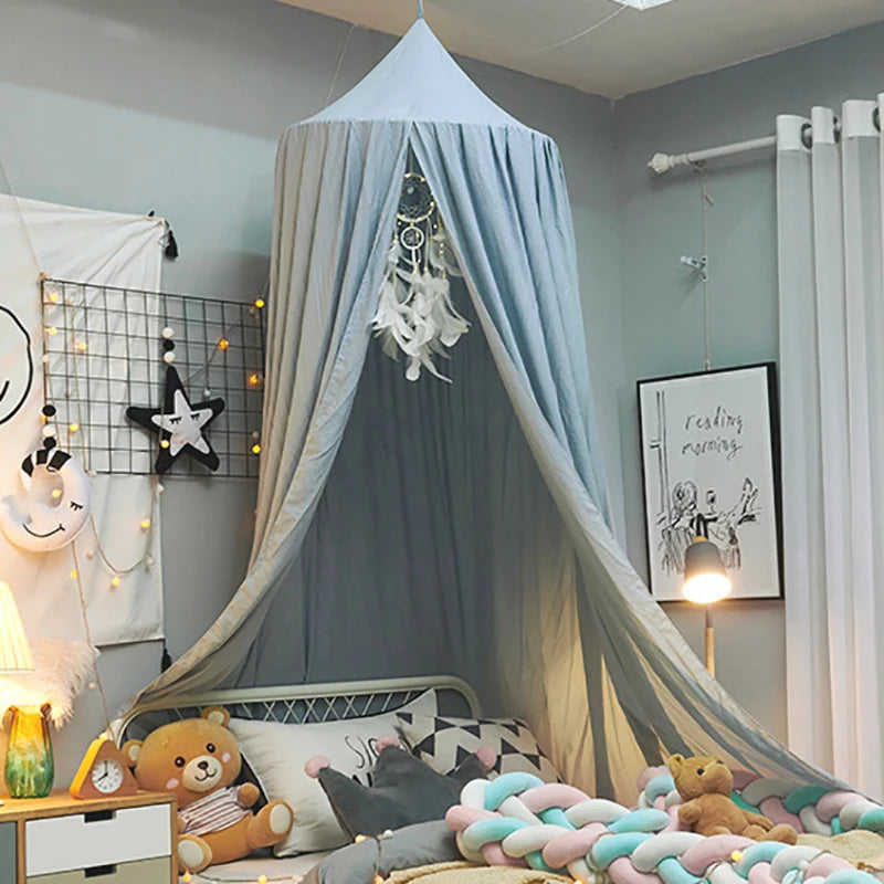 A princess hanging bed canopy for kids with light blue fabric and decorative elements.