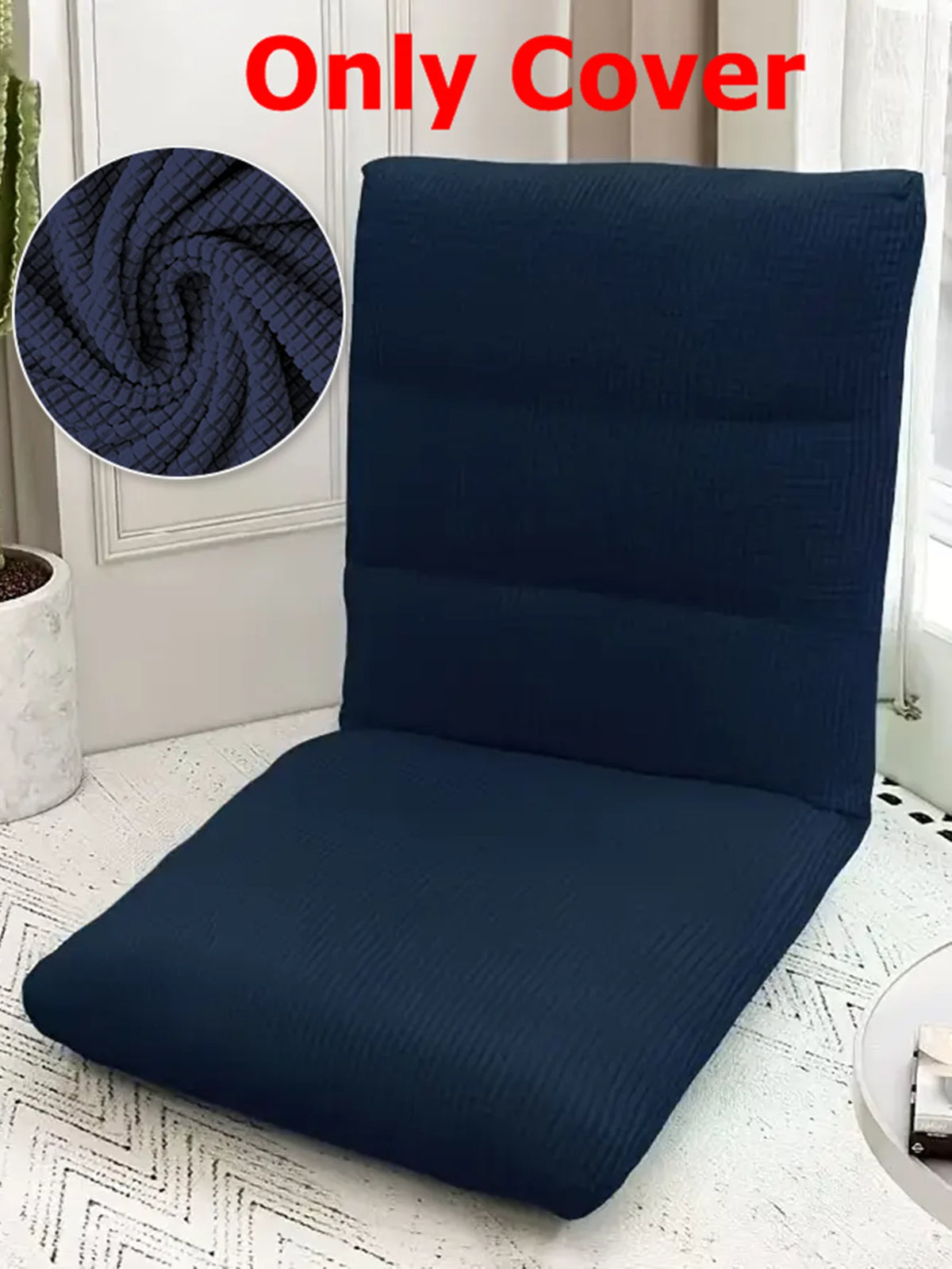 Dark blue folding tatami seat cover displayed on a white floor, showing the texture and fit.