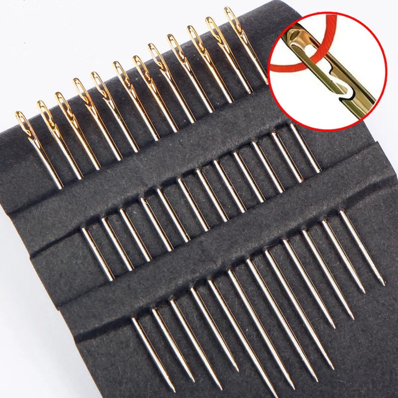 A black case containing a set of precision self-threading sewing needles with a magnified view of the needle tip