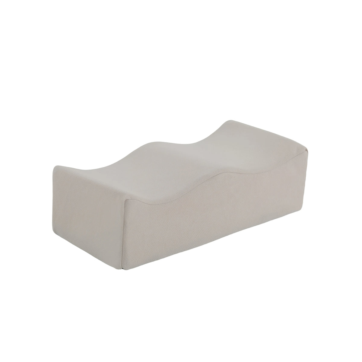 A beige ergonomic memory foam leg support pillow.