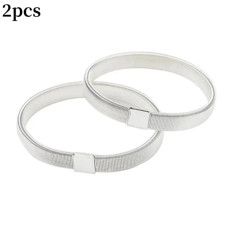 Two silver metal sleeve garters or adjustable arm bands for men
