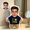 A custom photo face pillow featuring a man's portrait with the text I love you on the chest.