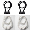 A set of four black magnetic curtain tiebacks and four white magnetic curtain tiebacks.