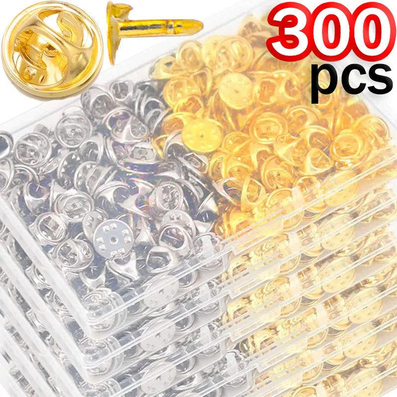 A collection of 300 metal pin findings including butterfly brooches and tie tacks in silver and gold colors.