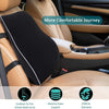 A memory foam lumbar support pillow with non-slip backing shown in a car seat interior.