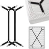 A set of black adjustable crisscross bed sheet clips used for secure holding.