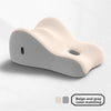 A beige and gray memory foam wedge pillow for couples shown from the side.
