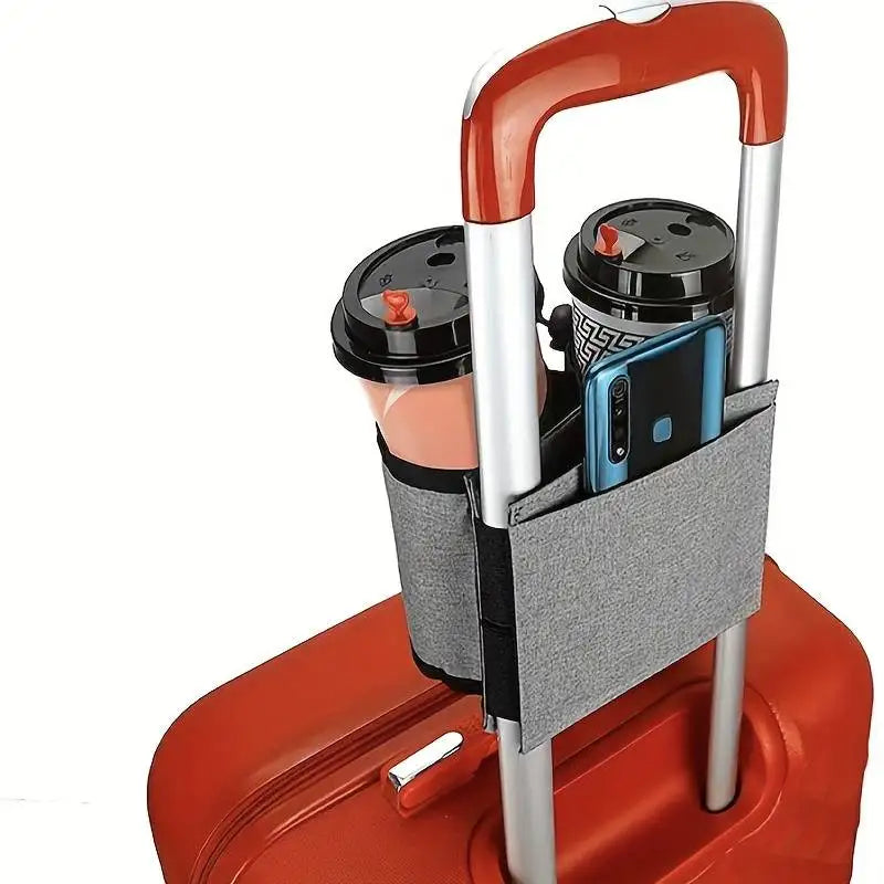 A portable, orange and silver cup holder designed to secure a travel cup for hands-free use.