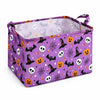 Purple Halloween storage basket with a pattern of bats, skulls, and pumpkins.