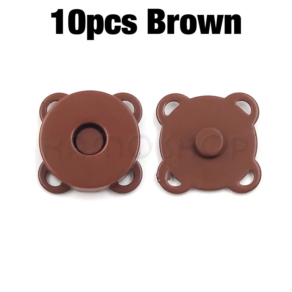 Pair of brown metal magnetic snap buttons for sewing