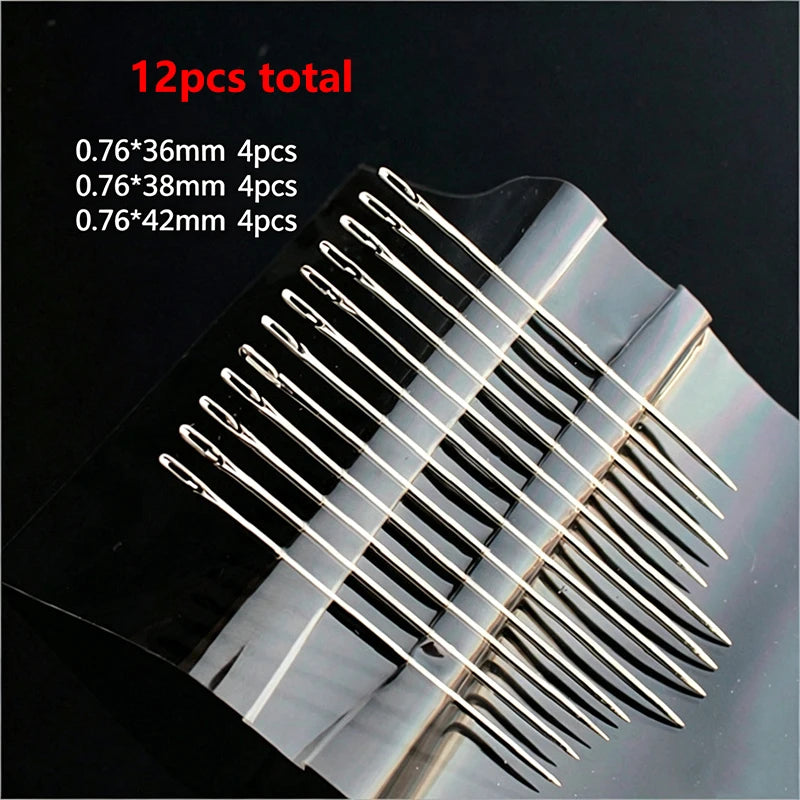 A close-up view of a stainless steel sewing kit showing various sizes of needles packaged in a plastic holder.