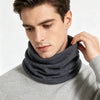 A man wearing a gray sweater and a dark gray soft cotton warm neck scarf