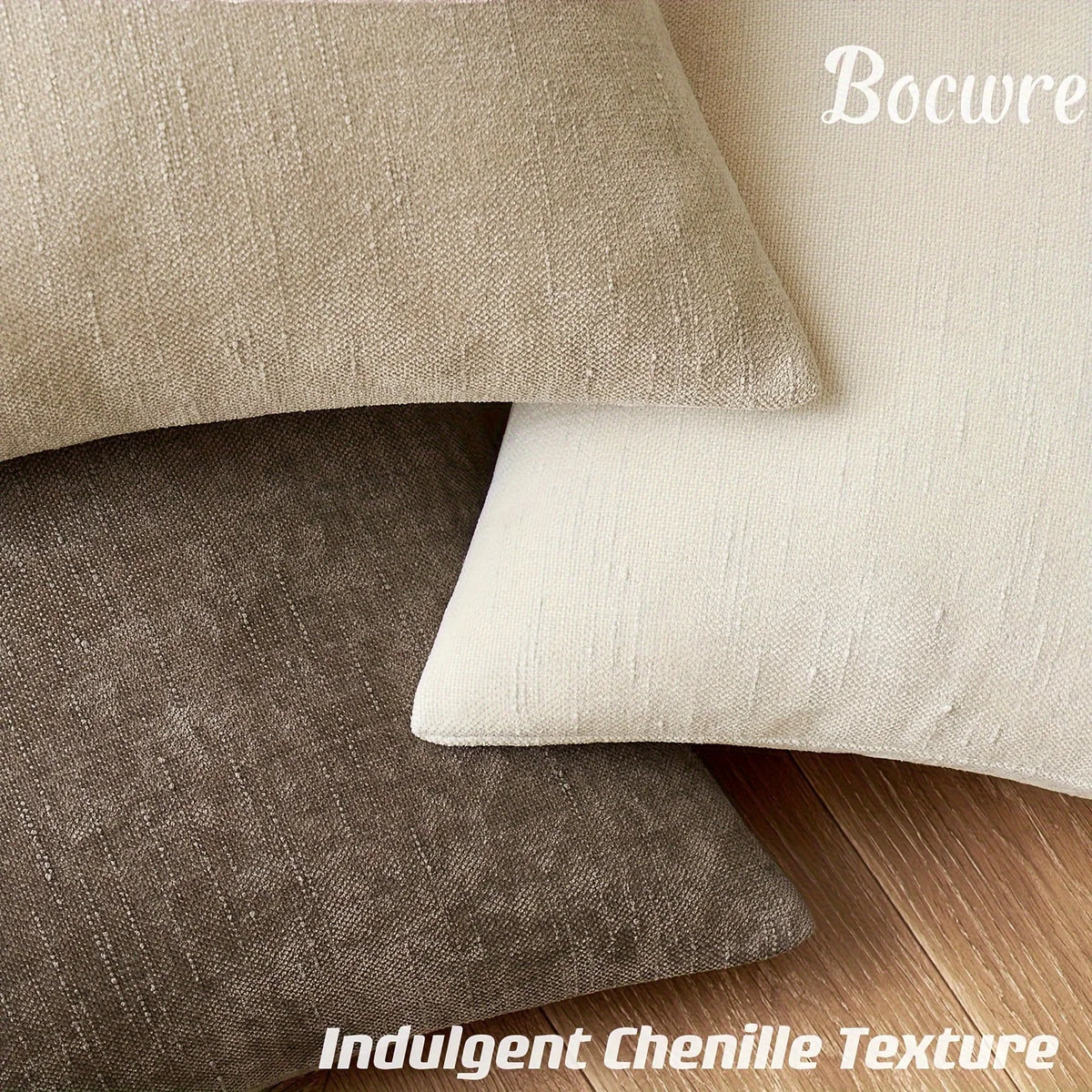 A close-up of three linen textured throw pillows in beige, olive green, and cream tones.