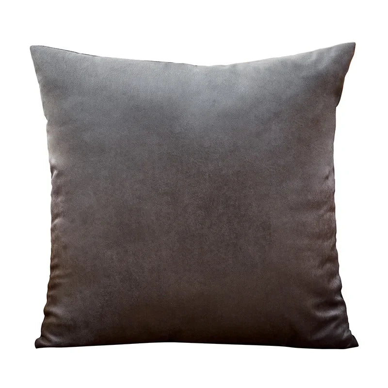 A dark gray velvet throw pillow cover with a smooth texture.