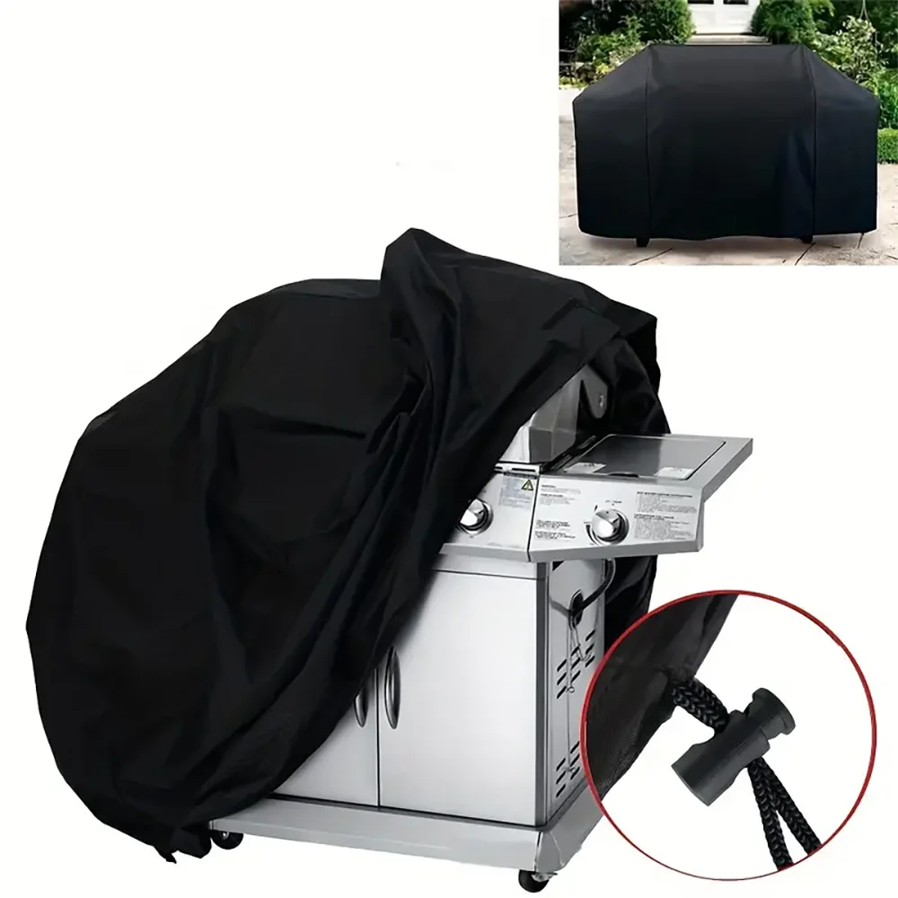 A black heavy-duty grill cover is shown draped over a stainless steel BBQ grill, with a close-up of the cover's strap visible