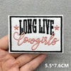 Pink embroidered slogan patch featuring the text LONG LIVE cowgirls with small star accents