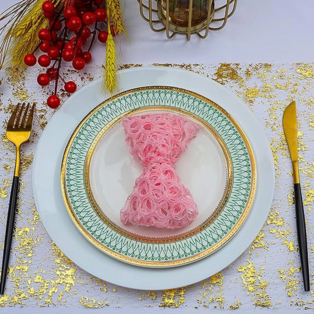 Pink glitter hair accessory displayed on a white plate with gold rim and green patterned plate on a gold confetti runner.