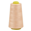 A roll of light beige sewing thread on a yellow spool.