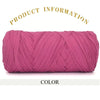 A skein of thick magenta polyester blended yarn coiled for crafting.
