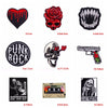 A collection of black embroidery patches featuring skulls, roses, and text like Punk Rock and Stay Positive.