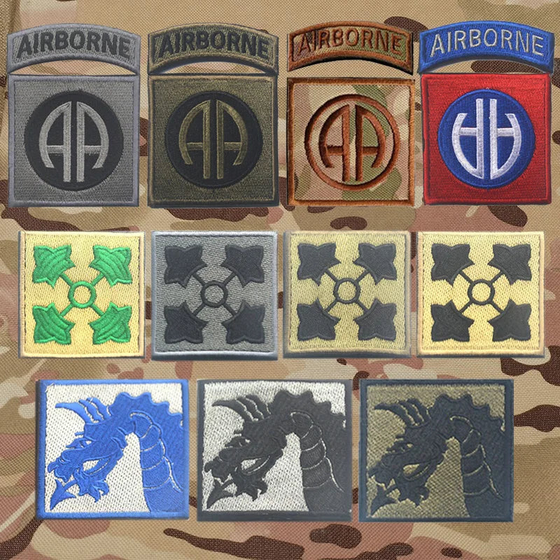A collection of embroidered tactical patches featuring various symbols and designs on a camouflage background.