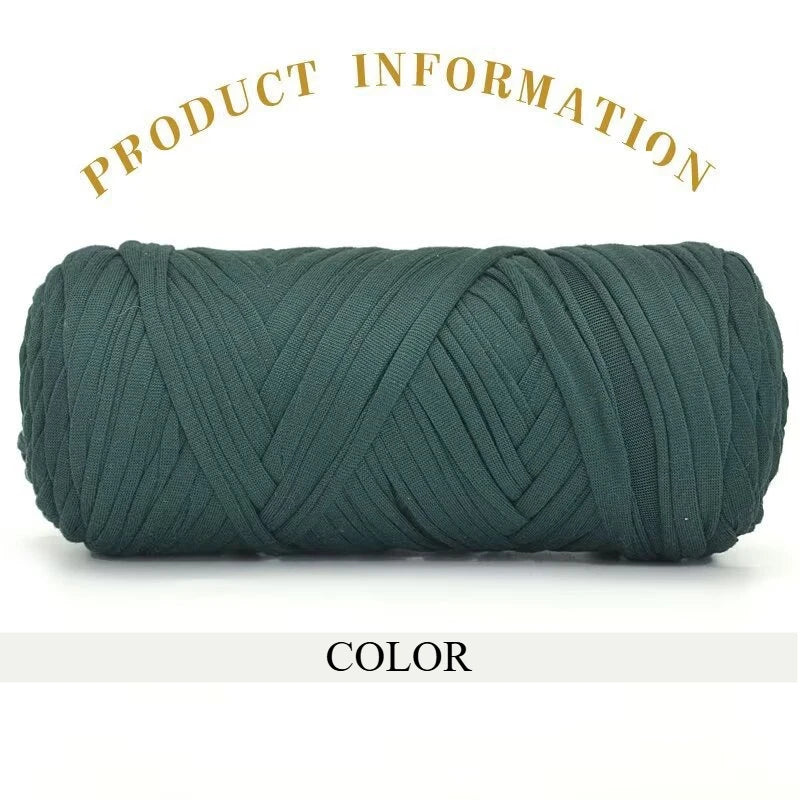 A skein of thick, dark teal polyester blended yarn coiled tightly for crafting.