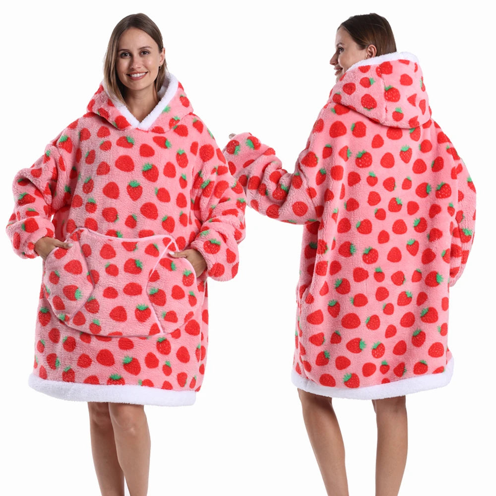 Two women modeling a pink and red patchwork fleece hoodie for winter
