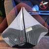 A folded universal mosquito net for baby stroller and car seat shown against a dark background.