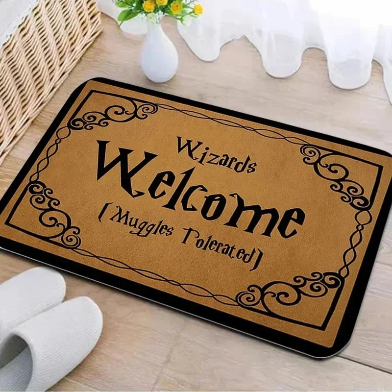A brown entrance mat with black lettering that reads Wizards Welcome Muggles Tolerated