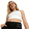 A model wearing a white cropped top and black pants with an adjustable belt.
