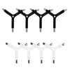A set of four black adjustable bed sheet holder clips arranged in a row.