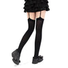 Black gothic lolita suspender socks worn with a black ruffled skirt and black shoes