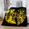 A black flannel throw blanket featuring a yellow graphic design with the text WU-TANG.