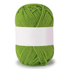 A ball of soft milk cotton knitting yarn in a light green color.