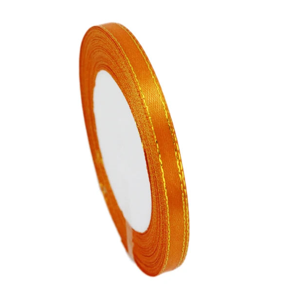 Roll of 6mm gold-edged satin ribbon for gift wrapping and crafts