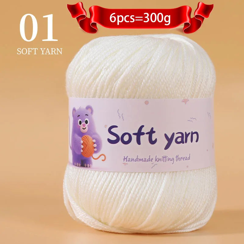 A ball of white soft yarn labeled as handmade knitting thread for crafting.