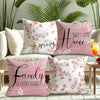 Pink decorative pillow covers featuring cherry blossoms and floral patterns for home decor