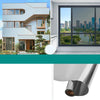 A modern house exterior featuring large windows with insulated glass film for privacy and sun protection.